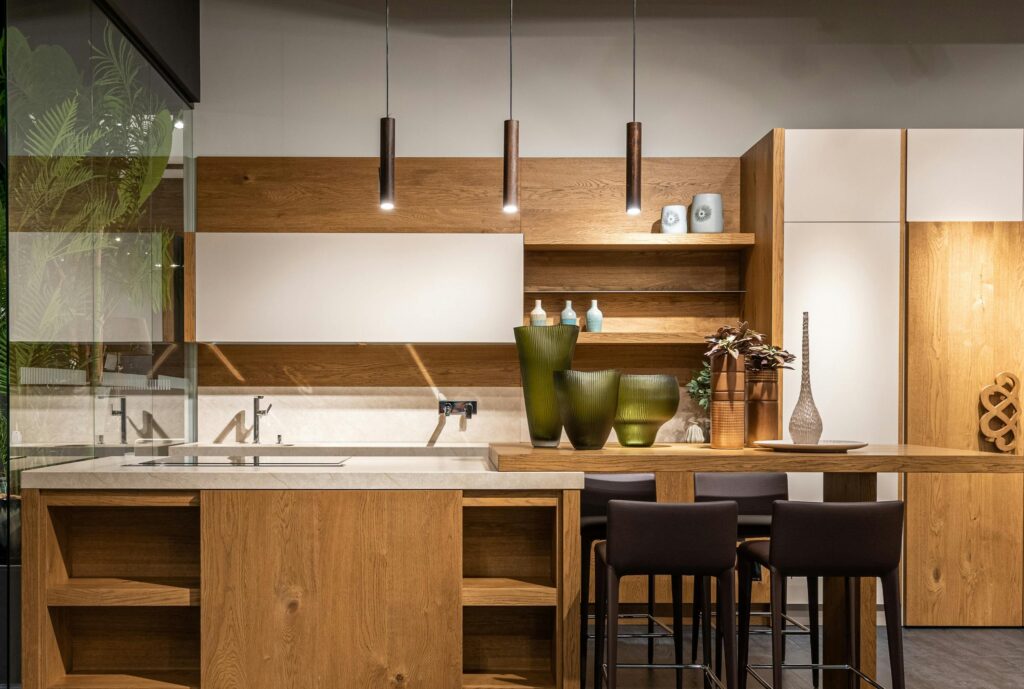 10 Easy Kitchen Decor Ideas to Transform Your Home in 2025 5 Explore this elegant modern kitchen featuring wooden cabinets and minimalist decor.